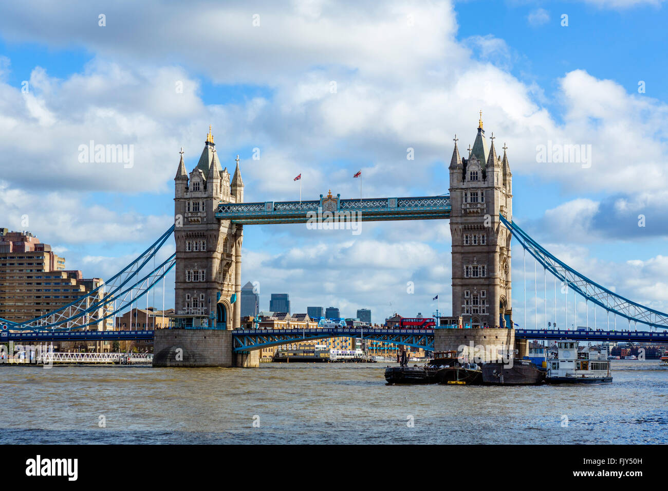 Tower Bridge from the South Bank with the skyscrapers of Canary Wharf ...