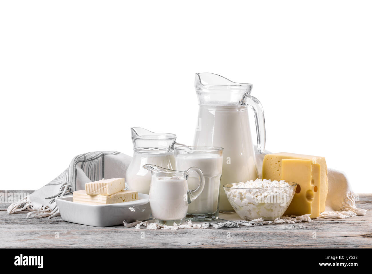 Fresh dairy products on an old wooden board Stock Photo