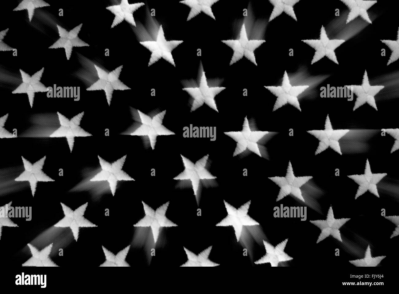 EMBROIDERED FIVE POINT WHITE STARS ON BLACK BACKGROUND Stock Photo