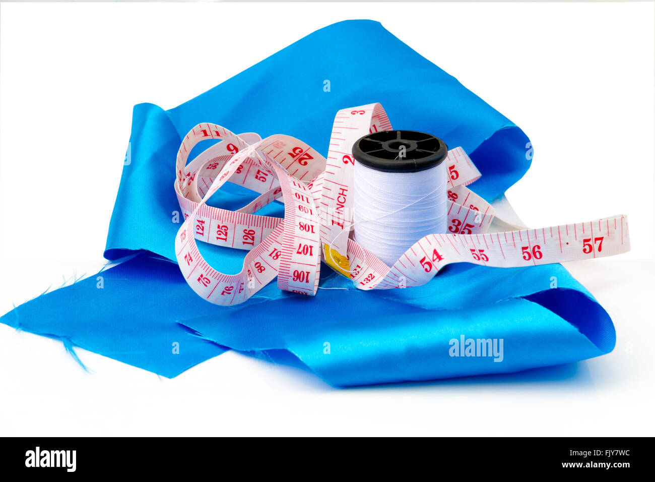 Set sewing thread, cloth, tape measure Stock Photo Alamy