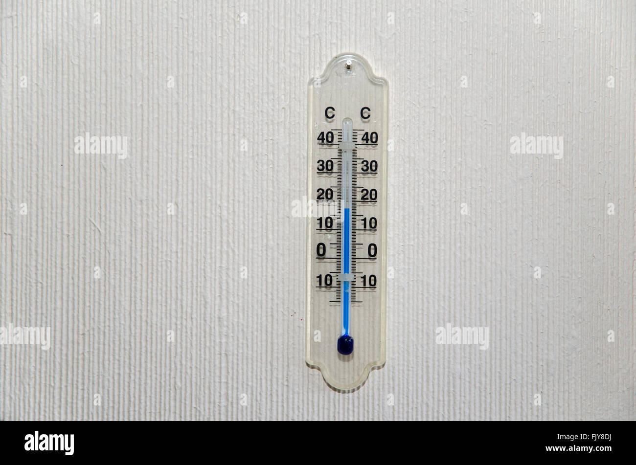 https://c8.alamy.com/comp/FJY8DJ/single-indoors-celcius-thermometer-at-a-bright-wall-FJY8DJ.jpg