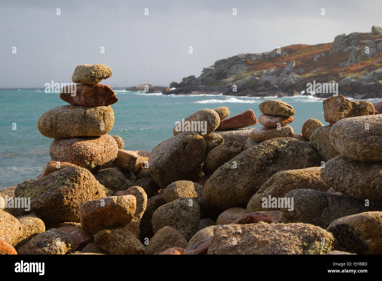 Rock piles on the beaches of the Scilly Isles, Cornwall Stock Photo