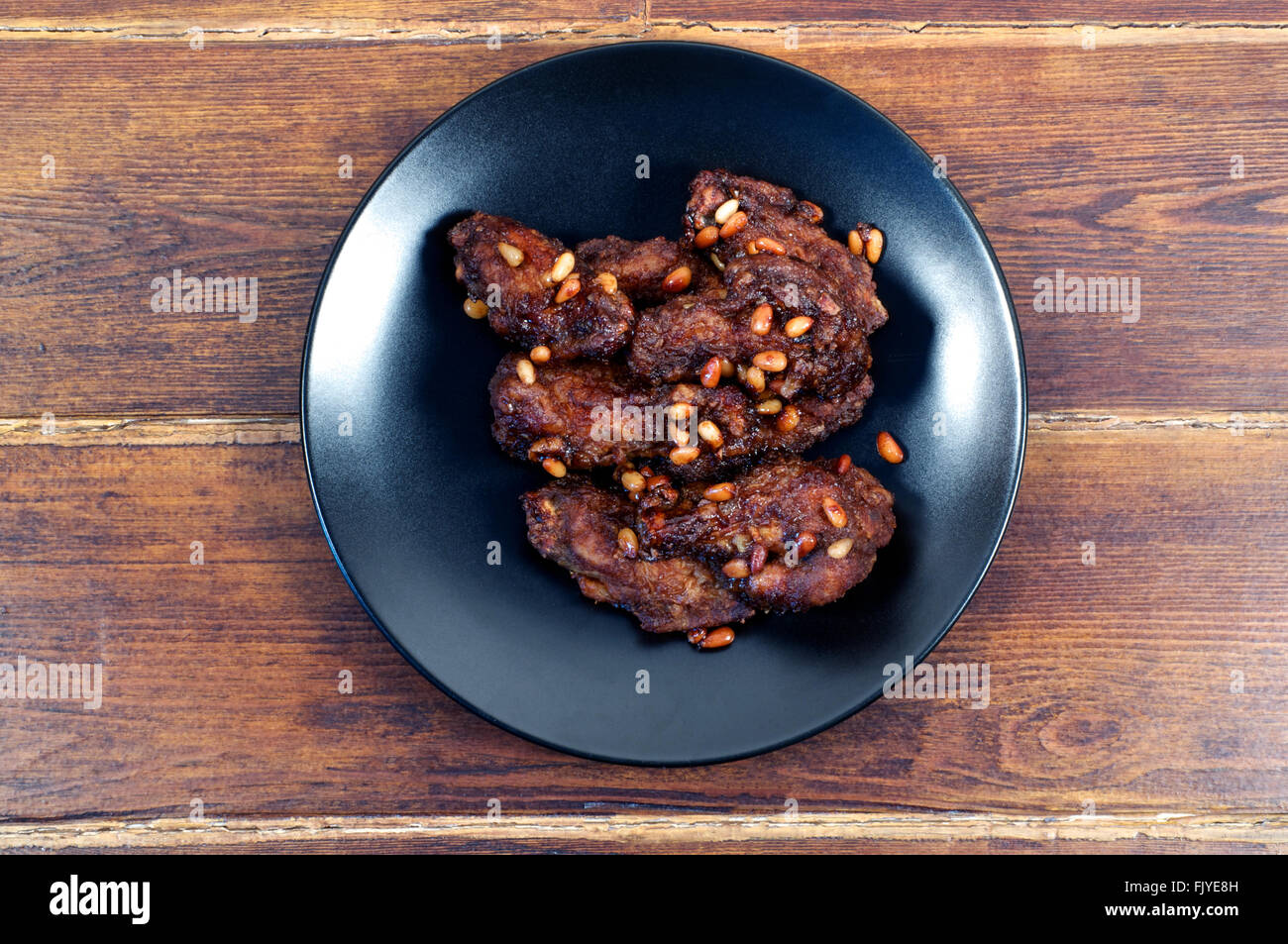 Korean glazed chicken wings over wooden background from top Stock Photo Alamy