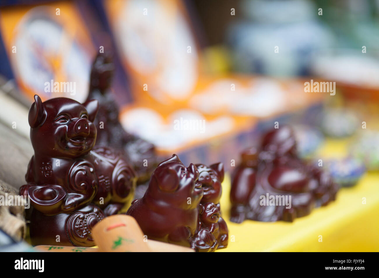 Brown Pig Figurines Displayed For Sale At Street Market Stock Photo Alamy