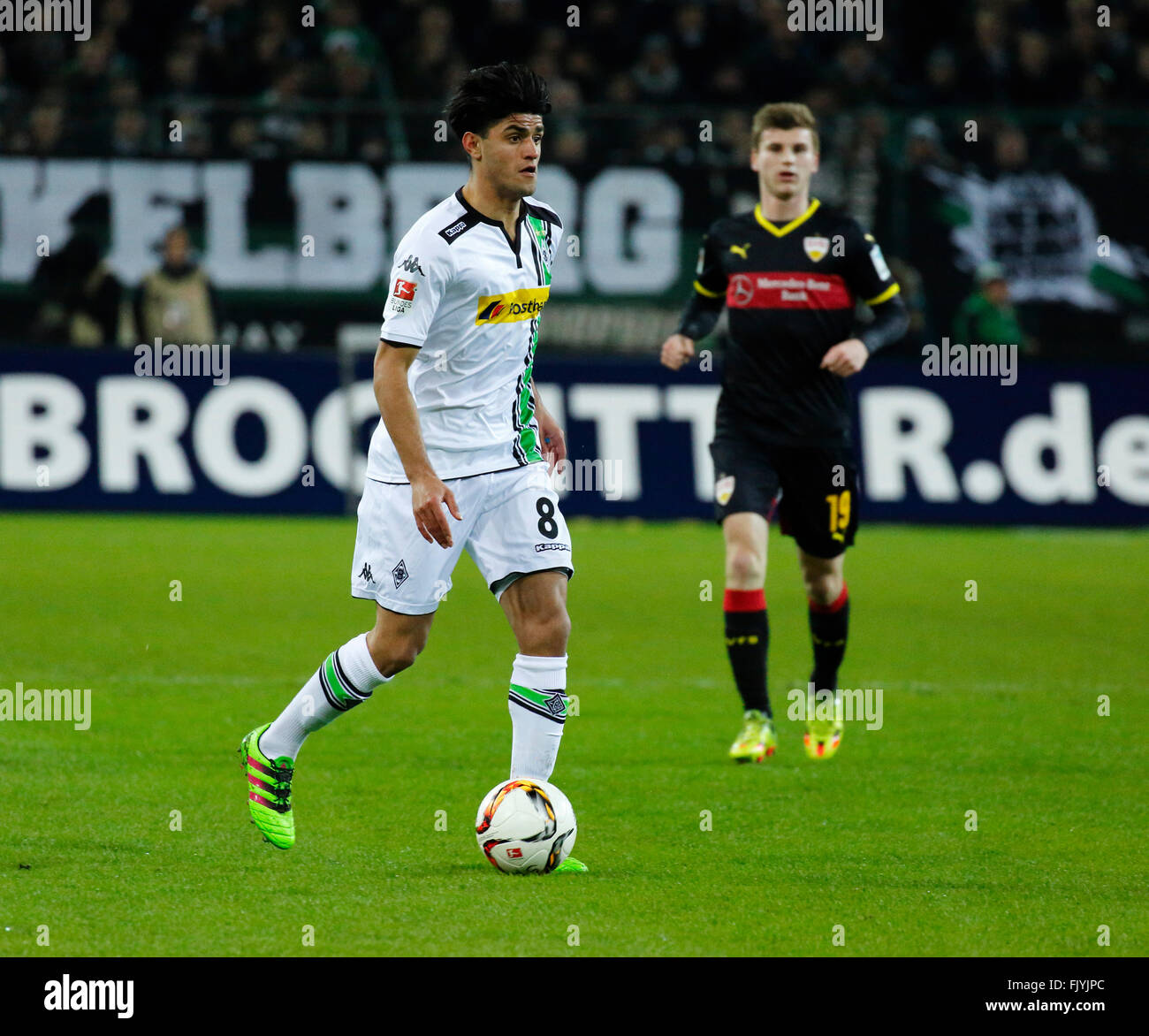 sports, football, Bundesliga, 2015/2016, Borussia Moenchengladbach versus VFB Stuttgart 4:0, Stadium Borussia Park, scene of the match, Mahmoud Dahoud (MG) in ball possession, behind Timo Werner (VFB) Stock Photo