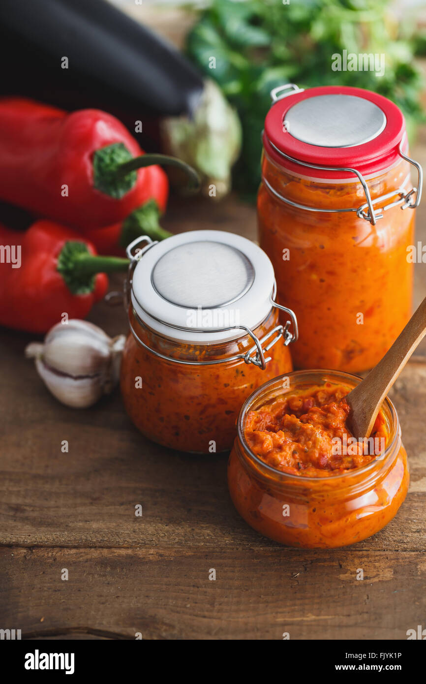 Jar of homemade ajvar, a delicious roasted red pepper and eggplant dish