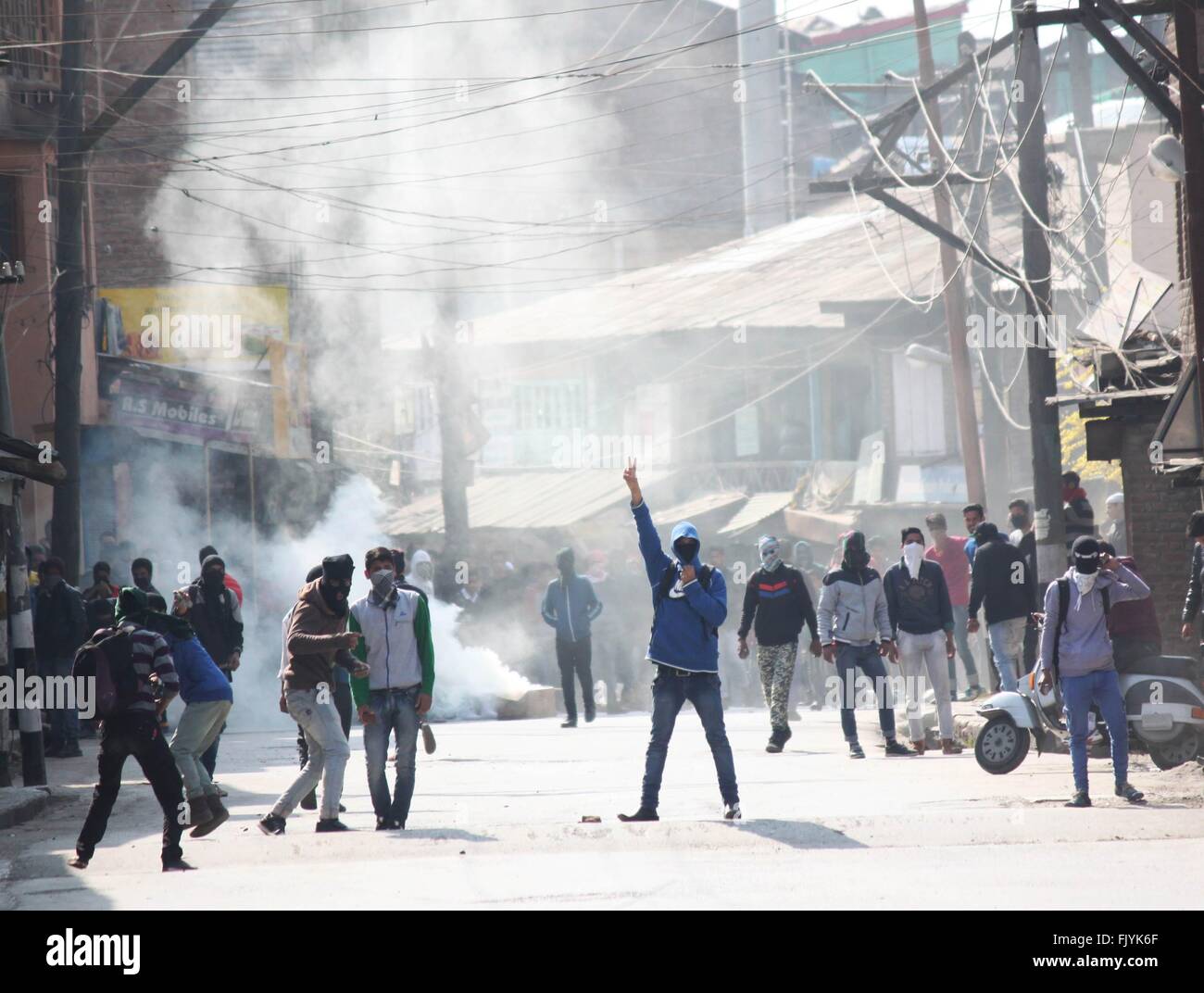 Kashmiri protester shouts anti-india slogans during clashes in Srinagar. Stock Photo