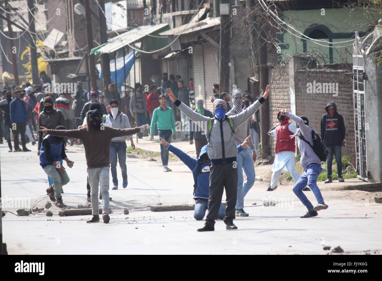 Kashmiri protesters shouts anti-india slogans during clashes in Srinagar. Stock Photo