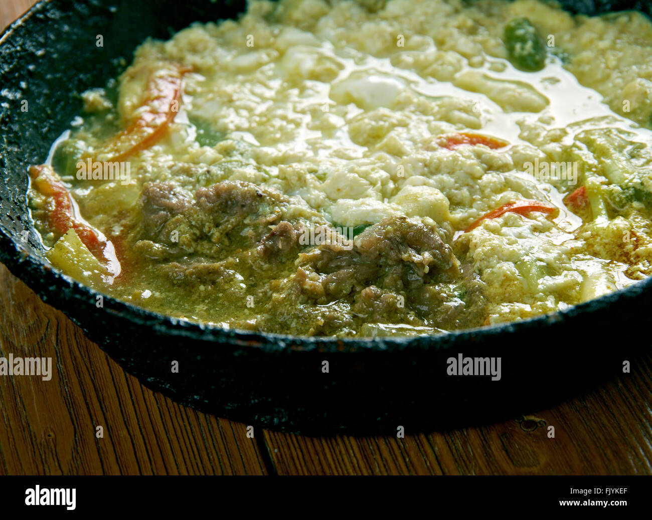 Saltah national dish of Yemen.meat stew called maraq, a dollop of