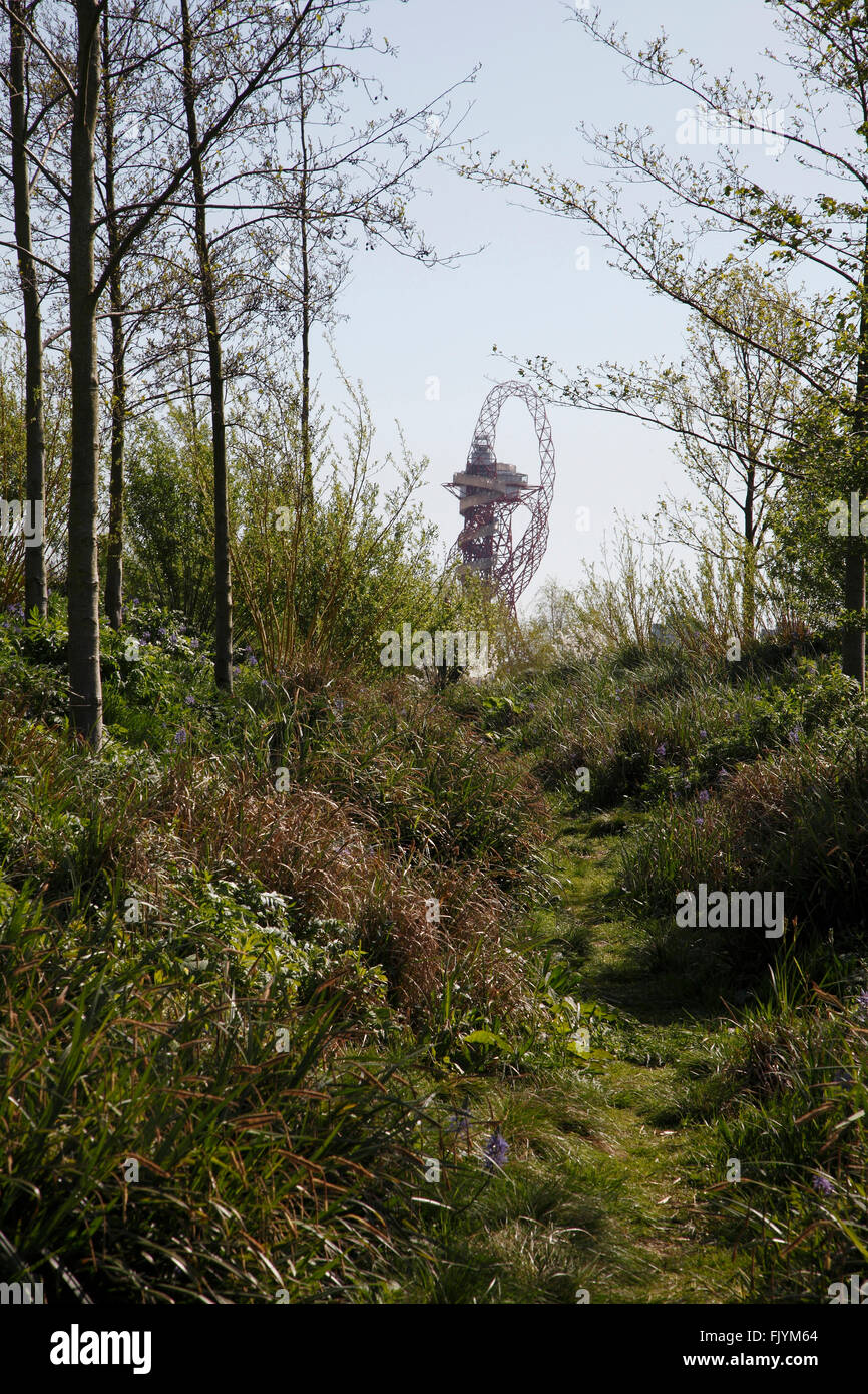 The Arcelor Mittal Orbit viewed through planting. Stock Photo
