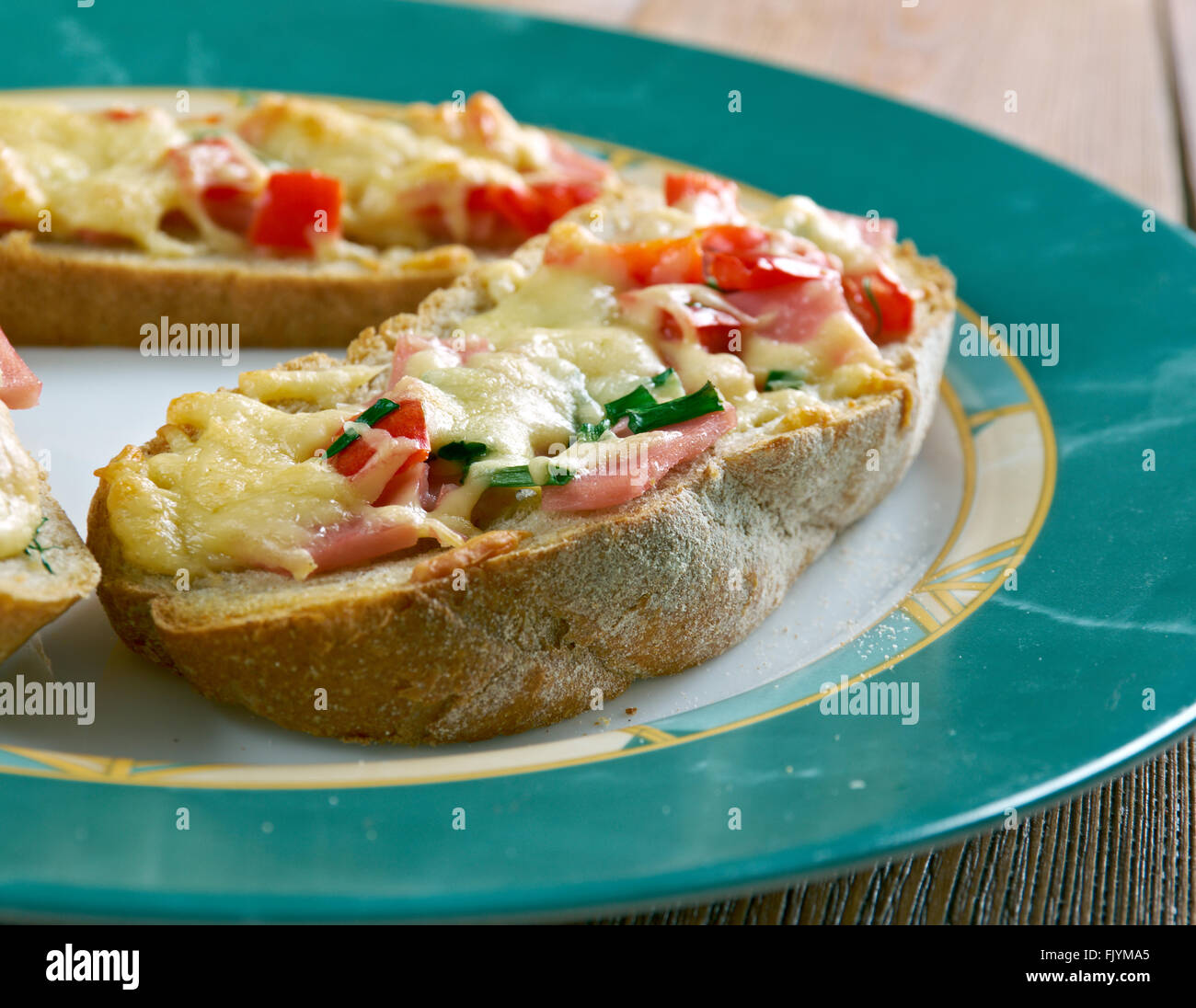Mushroom Gouda Melts.cheese steak sandwich . shredded steak smothered