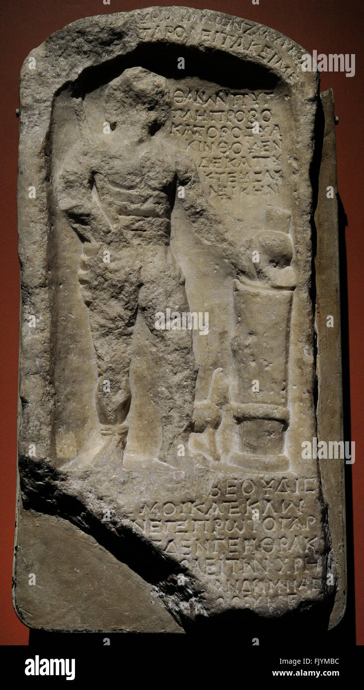 Roman tombstone with Greek verses with relief depicting a Murmillo Gladiator. 2nd century AD. Marble.  The State Hermitage Museum. Saint Petersburg. Russia. Stock Photo