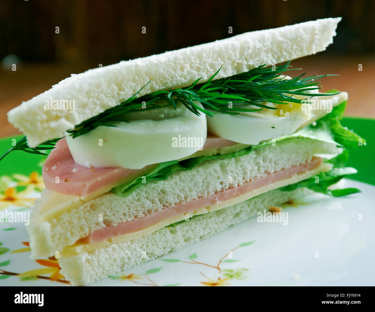 rand Oswald Voornaamwoord Tramezzino triangular sandwich constructed from two slices of soft white  bread with the crusts.Italian cuisine Stock Photo - Alamy