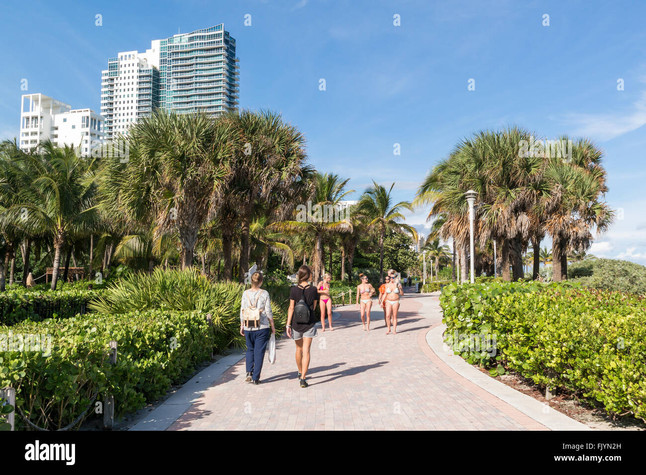 People walking on South Beach Boardwalk in Miami Beach, Florida, USA Stock Photo