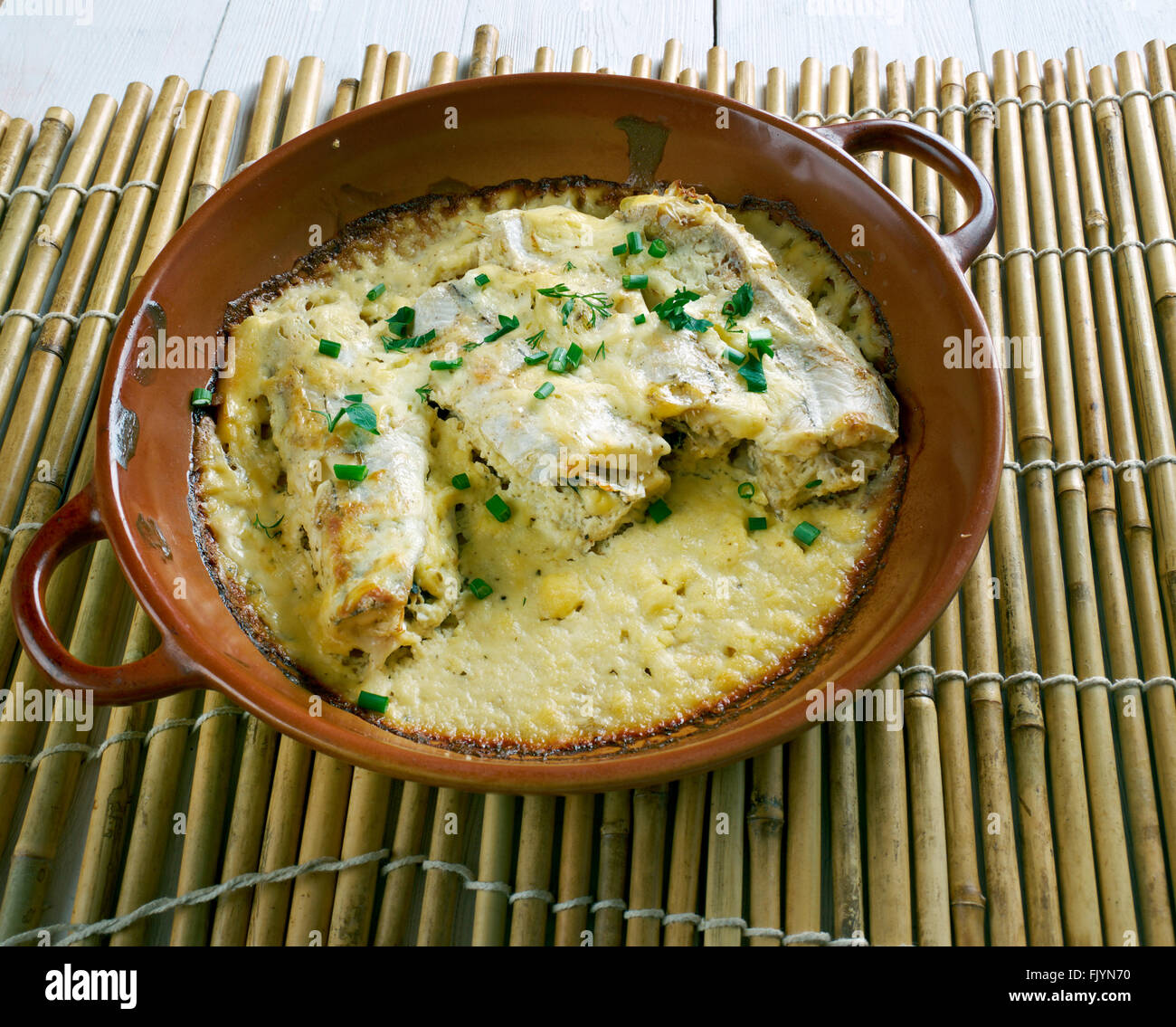 baked cod in sour cream . close up Stock Photo - Alamy