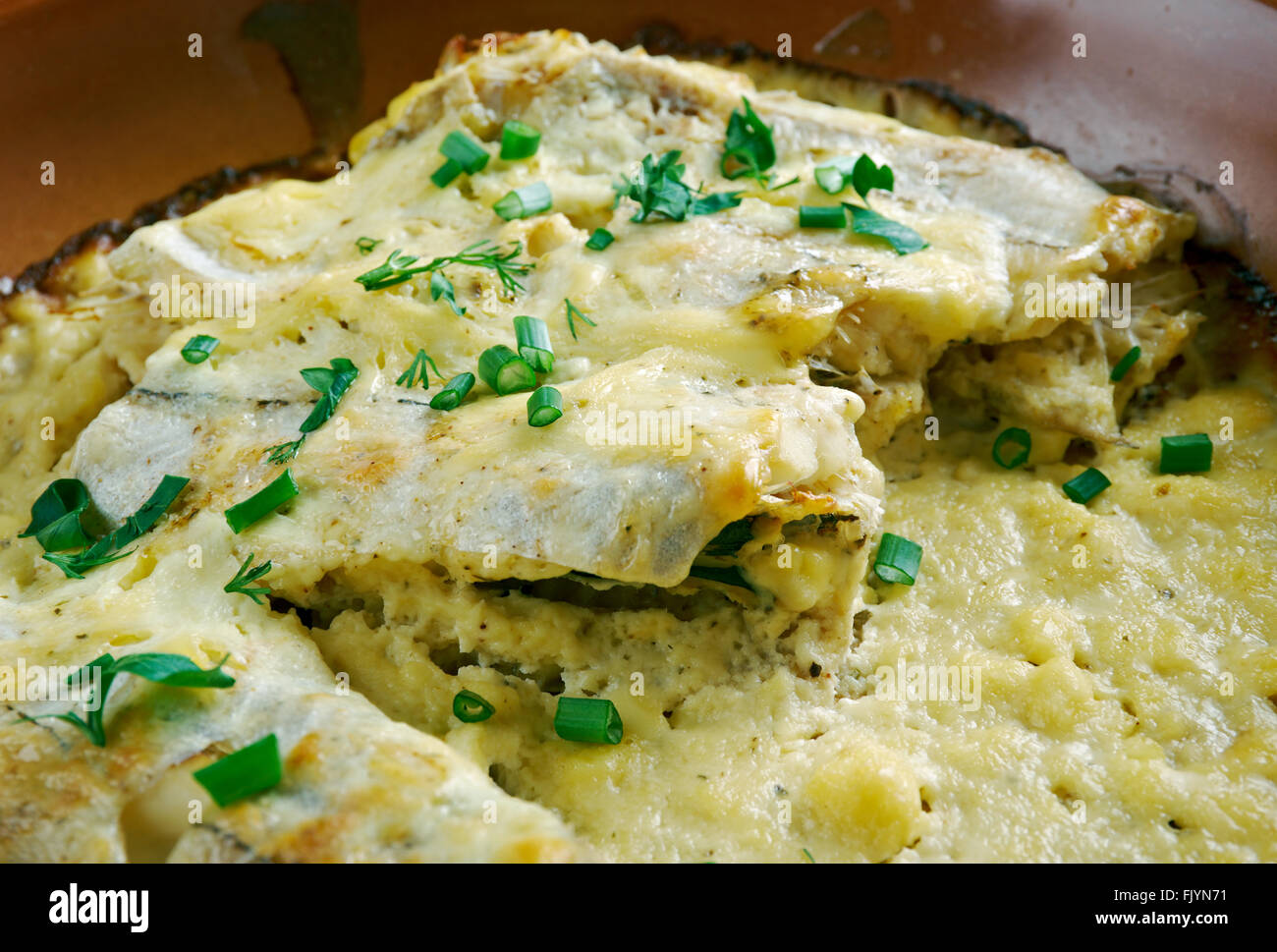 baked cod in sour cream . close up Stock Photo - Alamy