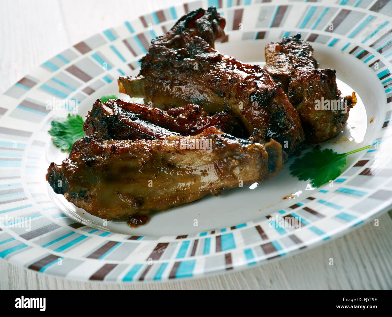 Slow-cooker apple-glazed ribs Stock Photo