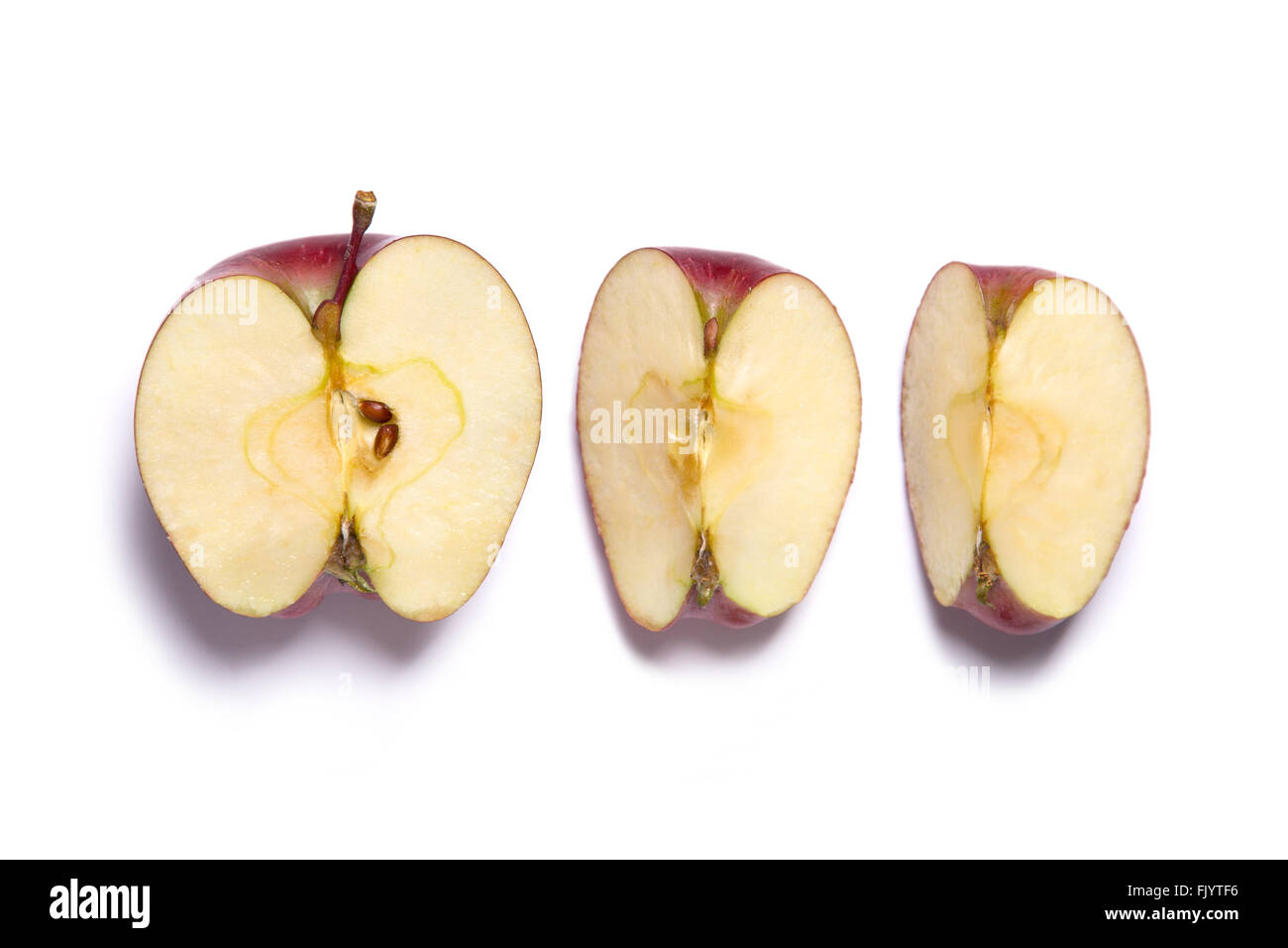 https://c8.alamy.com/comp/FJYTF6/red-delicious-apple-cut-in-half-and-quarters-top-view-isolated-on-FJYTF6.jpg