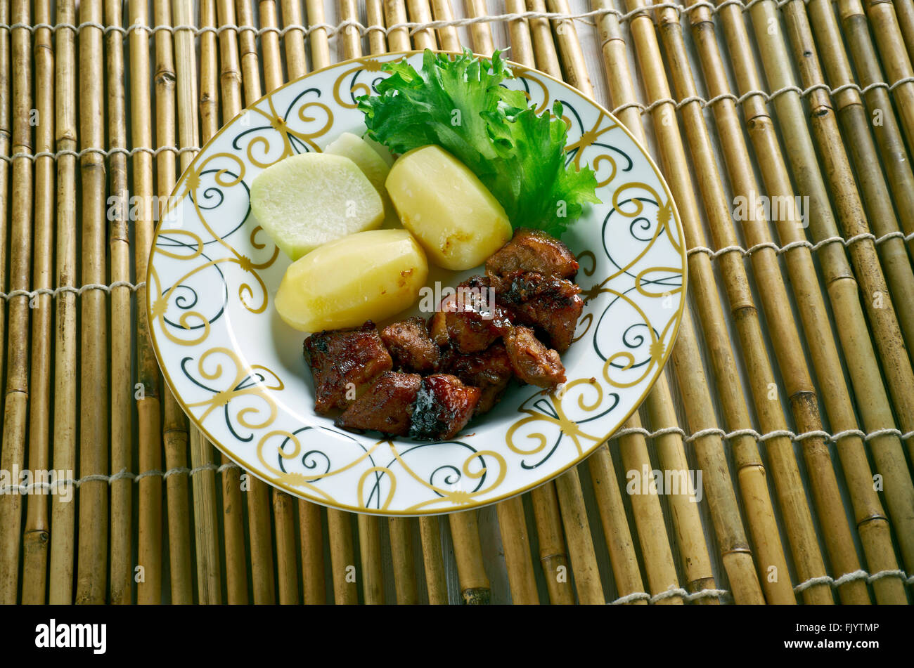 Filipino Braised Pork Adobo.pork cooked in soy sauce, vinegar, and