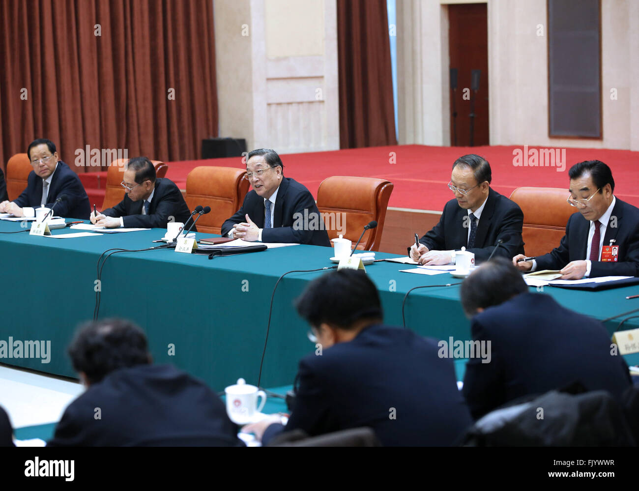 Beijing, China. 4th Mar, 2016. Yu Zhengsheng (3rd L), chairman of the National Committee of the Chinese People's Political Consultative Conference, joins a panel discussion with political advisors from medical and health care sector during the ongoing annual session of the country's top political advisory body in Beijing, capital of China, March 4, 2016. © Pang Xinglei/Xinhua/Alamy Live News Stock Photo