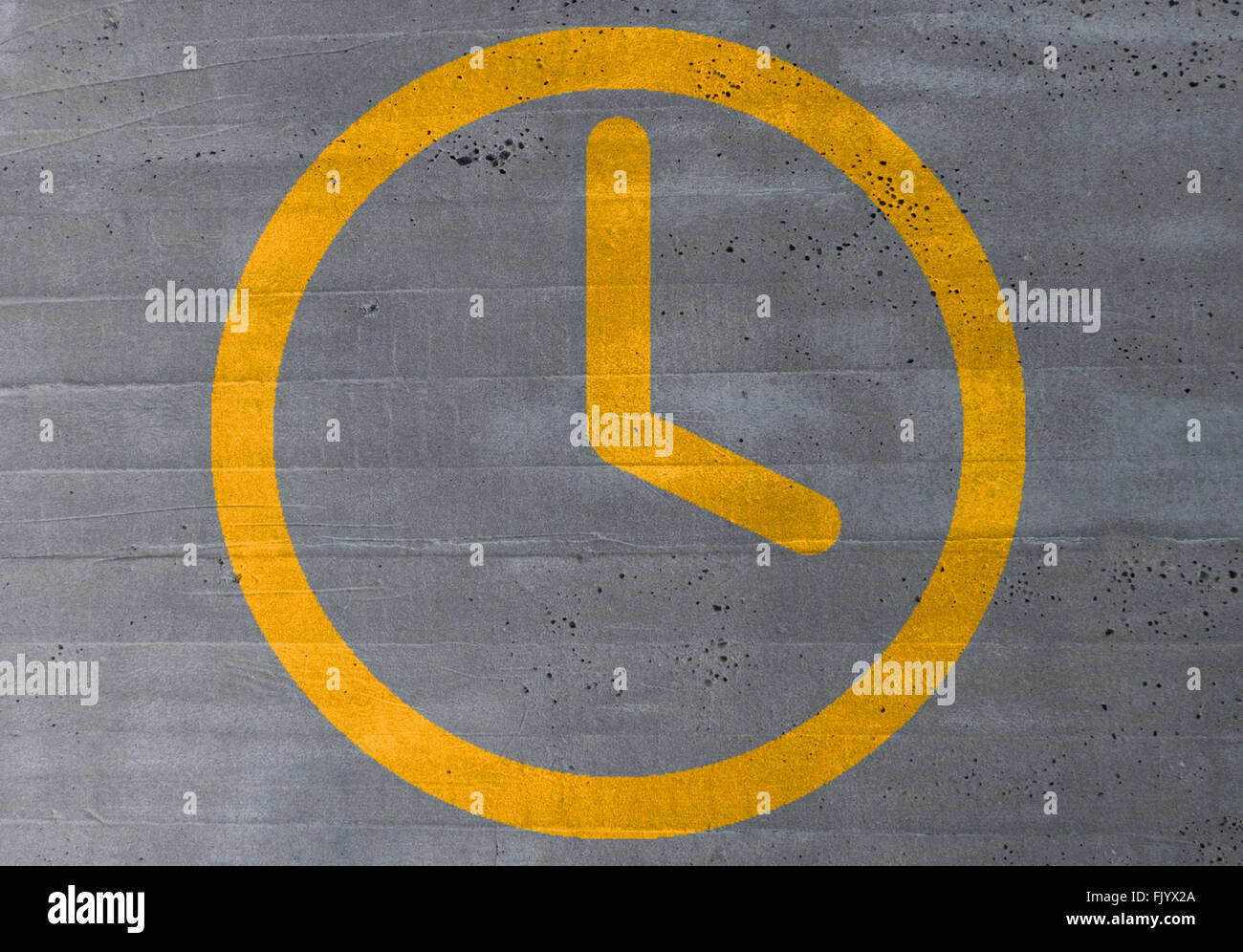 clock icon on cement concept background. Stock Photo