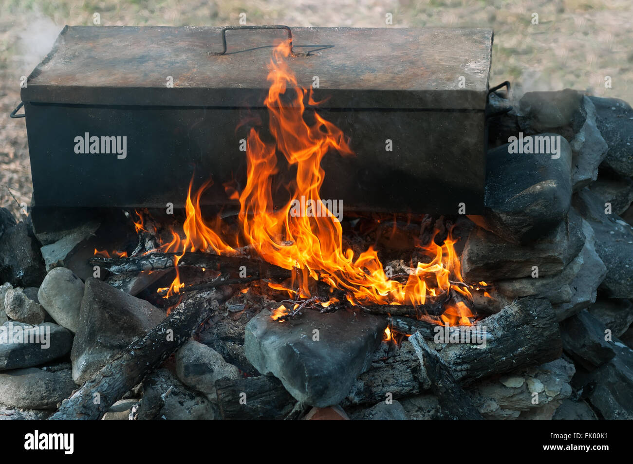 Campfire cooking in oven Stock Photo