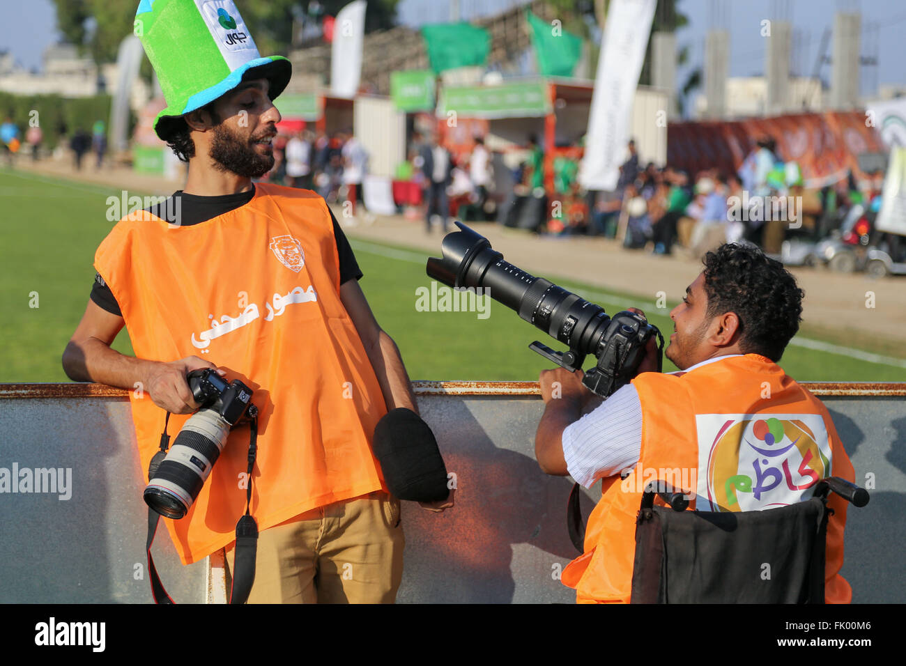 M R Faiz Dubai, United Arab Emirates. 23rd Feb, 2016. Momen Faiz(R) talking with ...