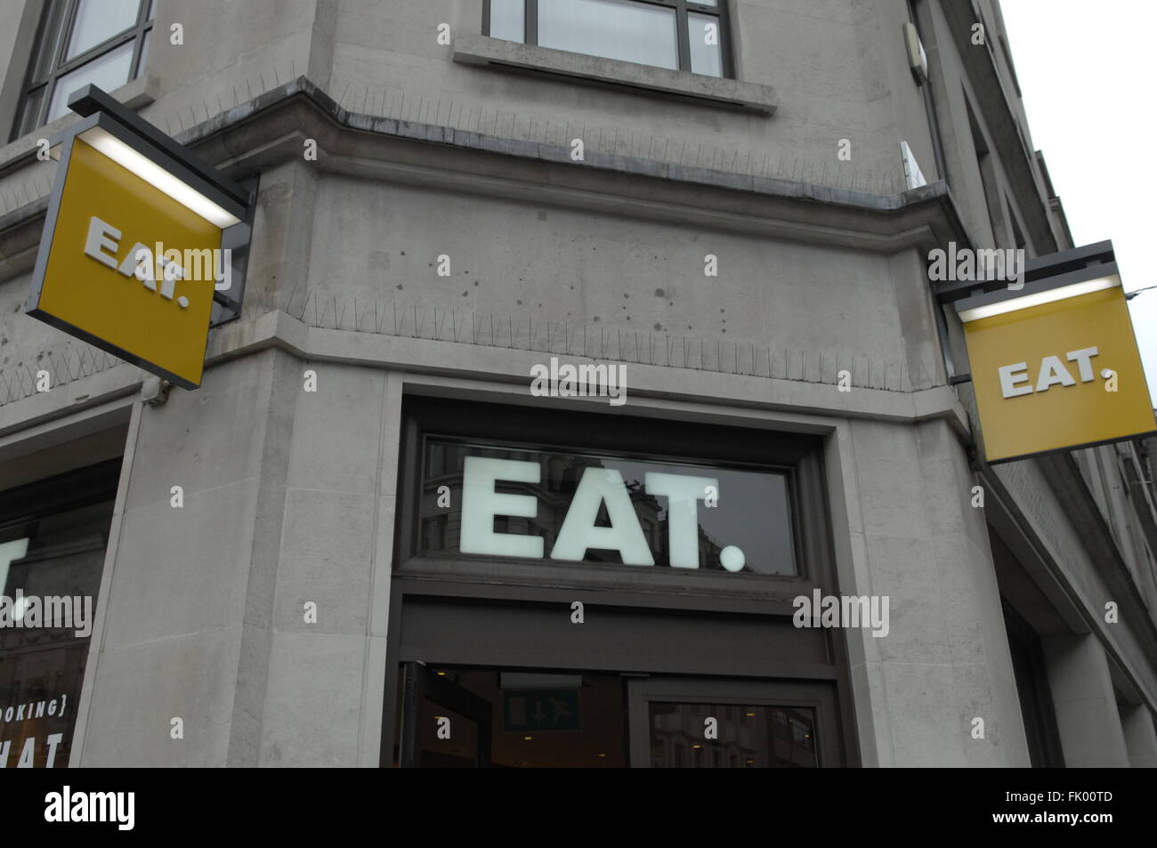 EAT signs on exterior of shop in Piccadilly,London,UK Stock Photo