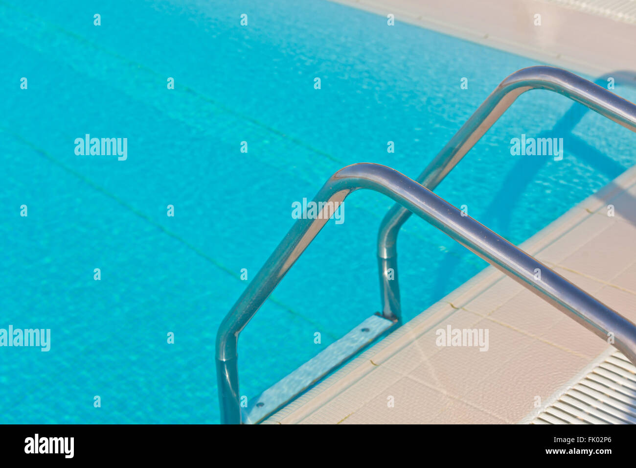 Ladder of a swimming pool. Horizontal shot Stock Photo - Alamy