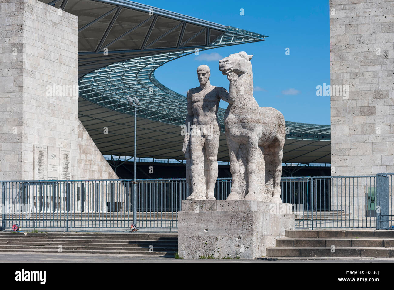Monumental sculpture Rosseführer of Josef Wackerle, 1936, Olympic Stadium behind, Reichssportfeld, today Olympic Park Stock Photo
