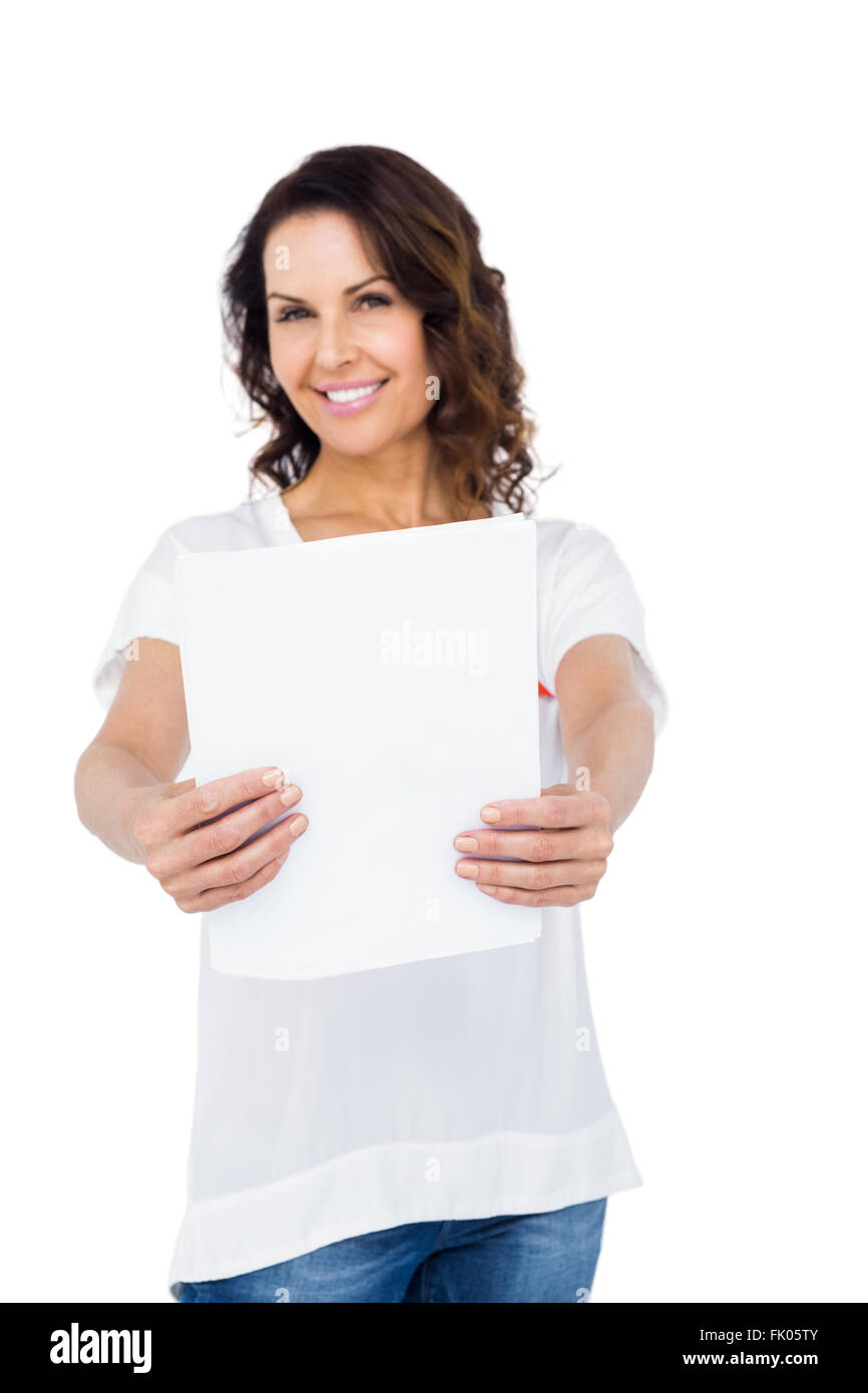 Woman wearing red aids awareness ribbon reading test result Stock Photo