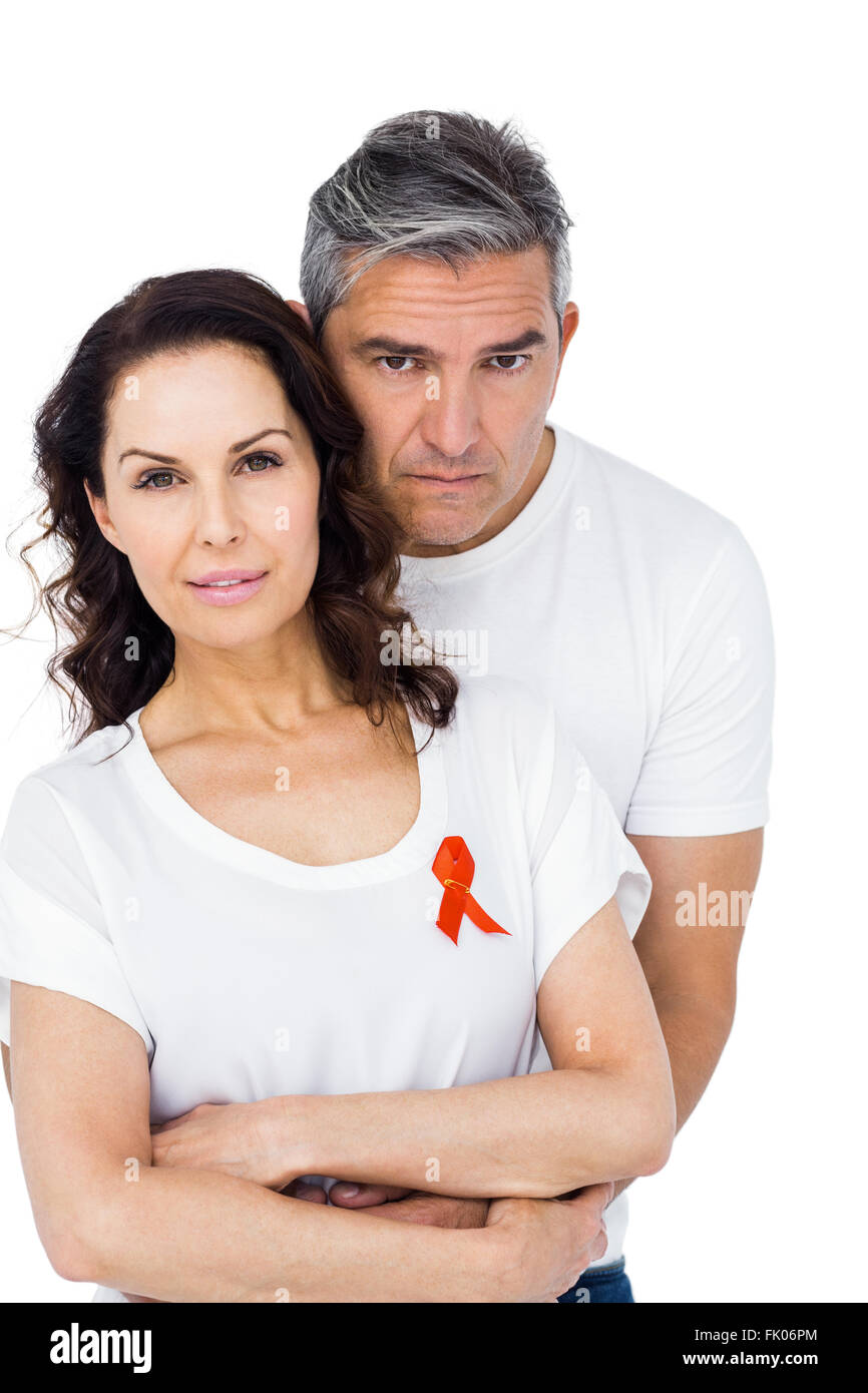 Couple supporting aids awareness together Stock Photo