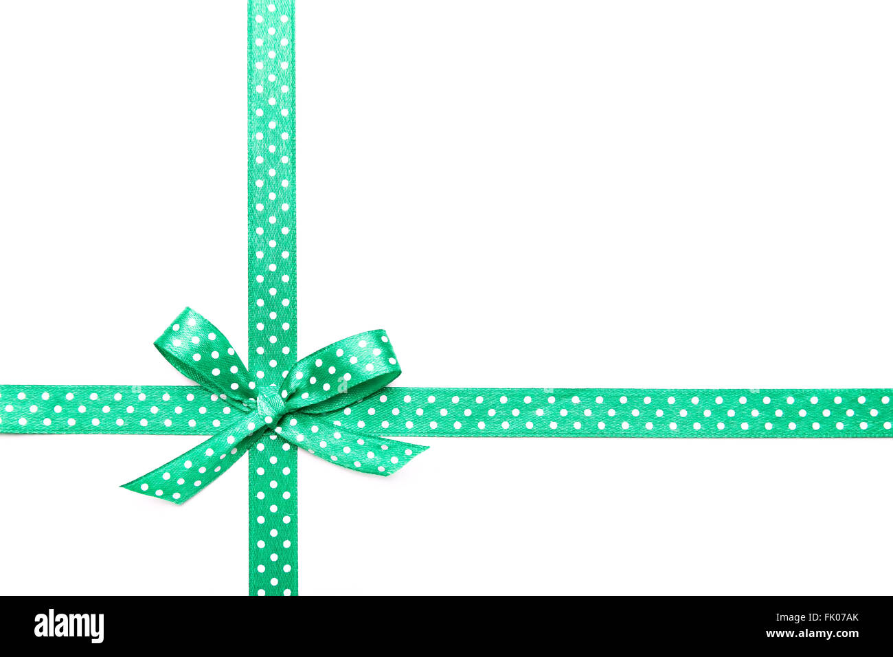 green ribbon with dots isolated on white background, copy space Stock Photo