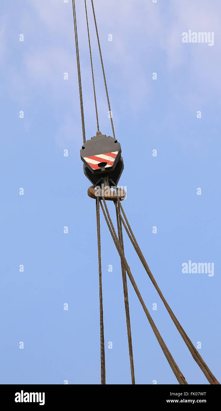 giant pulley with sturdy steel cables to lift heavy loads during loading Stock Photo Alamy