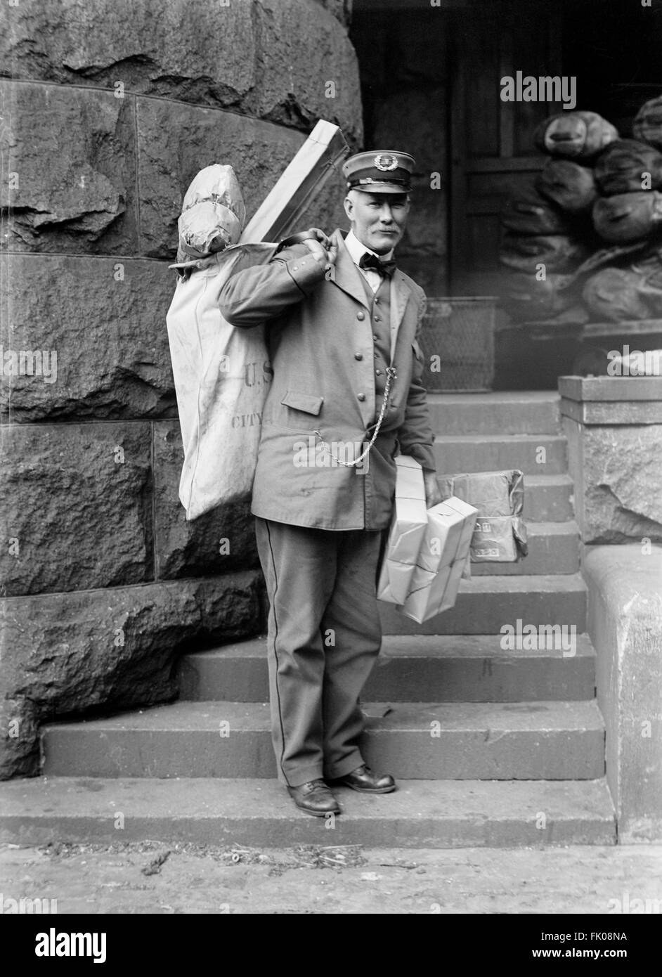 Mailman Delivering Parcel Posts, USA, circa 1914 Stock Photo