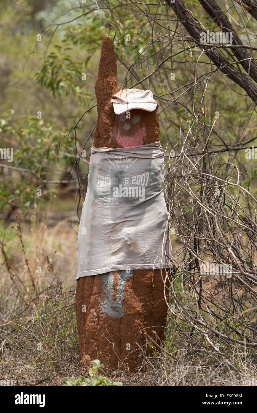 Termite mound dressed in t-shirt and cap in the Northern Territory. Stock Photo