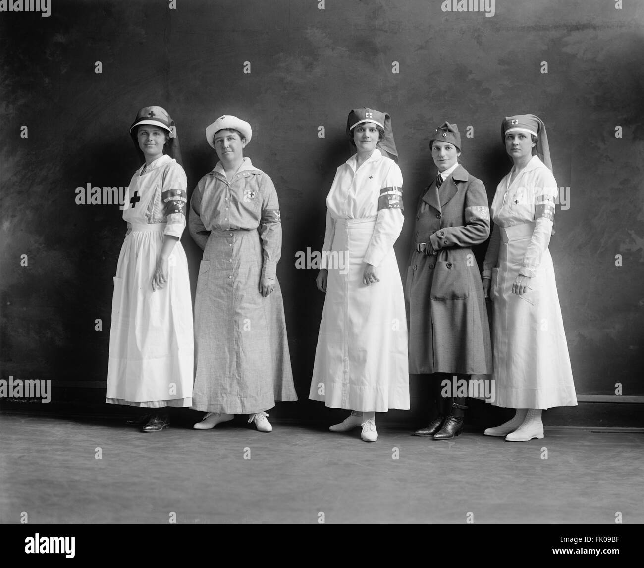 Group of Female American Red Cross Workers dressed in Red Cross Uniforms, full-length portrait, Harris & Ewing, 1910 Stock Photo