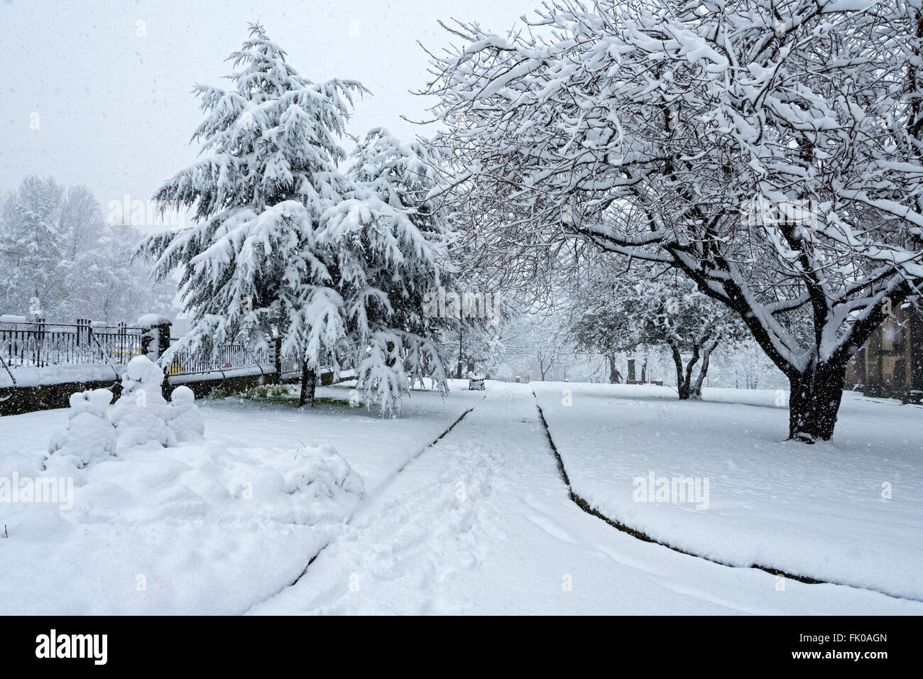 The grounds of Oldham Parish Church during a heavy snow fall, Oldham