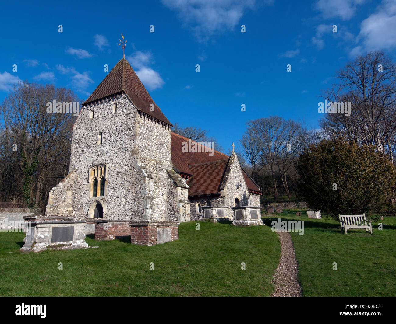 All Saints Church in the East Sussex village of West Dean Stock Photo