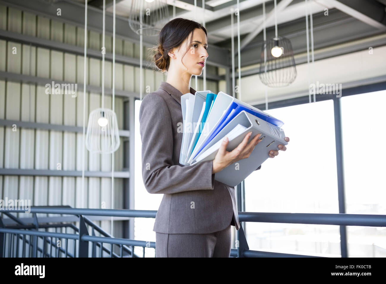 Tired overworked busy businesswoman Stock Photo