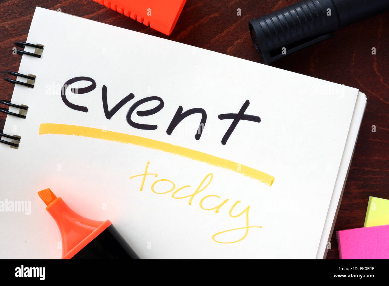 Events concept  written in a notebook on a wooden table. Stock Photo