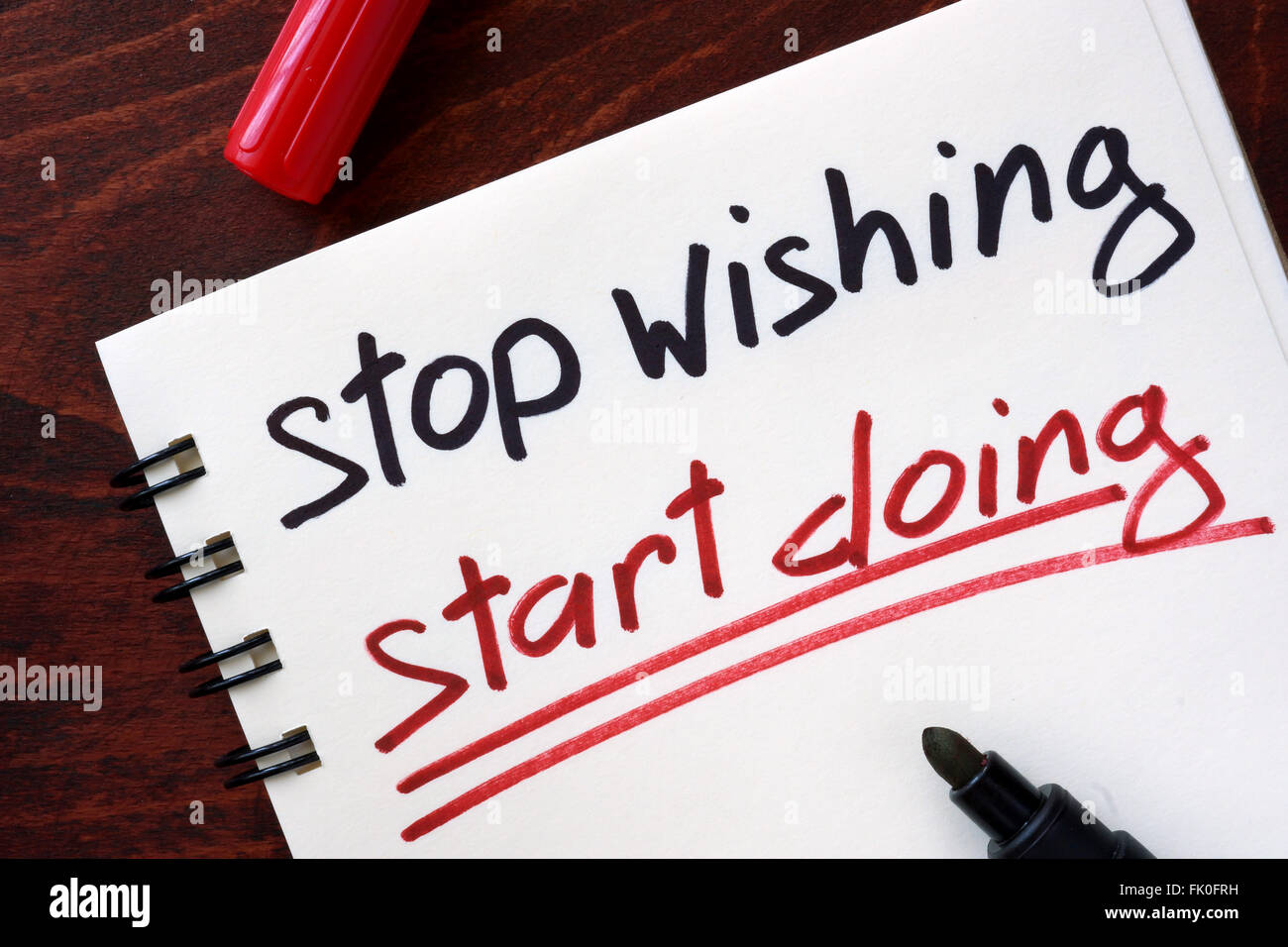 Motivation quotes. Stop wishing, start doing. Stock Photo