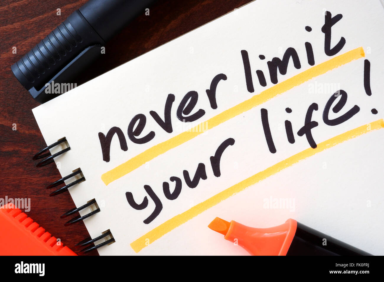 Inspiration quotes. Never limit your life. Stock Photo