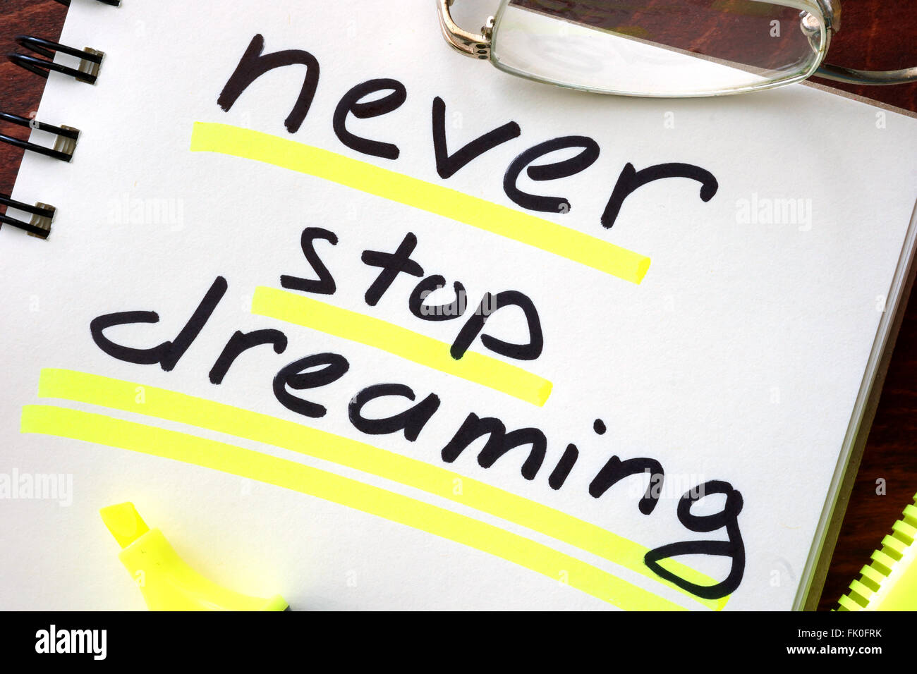 Motivation quote.  Never stop dreaming. Stock Photo