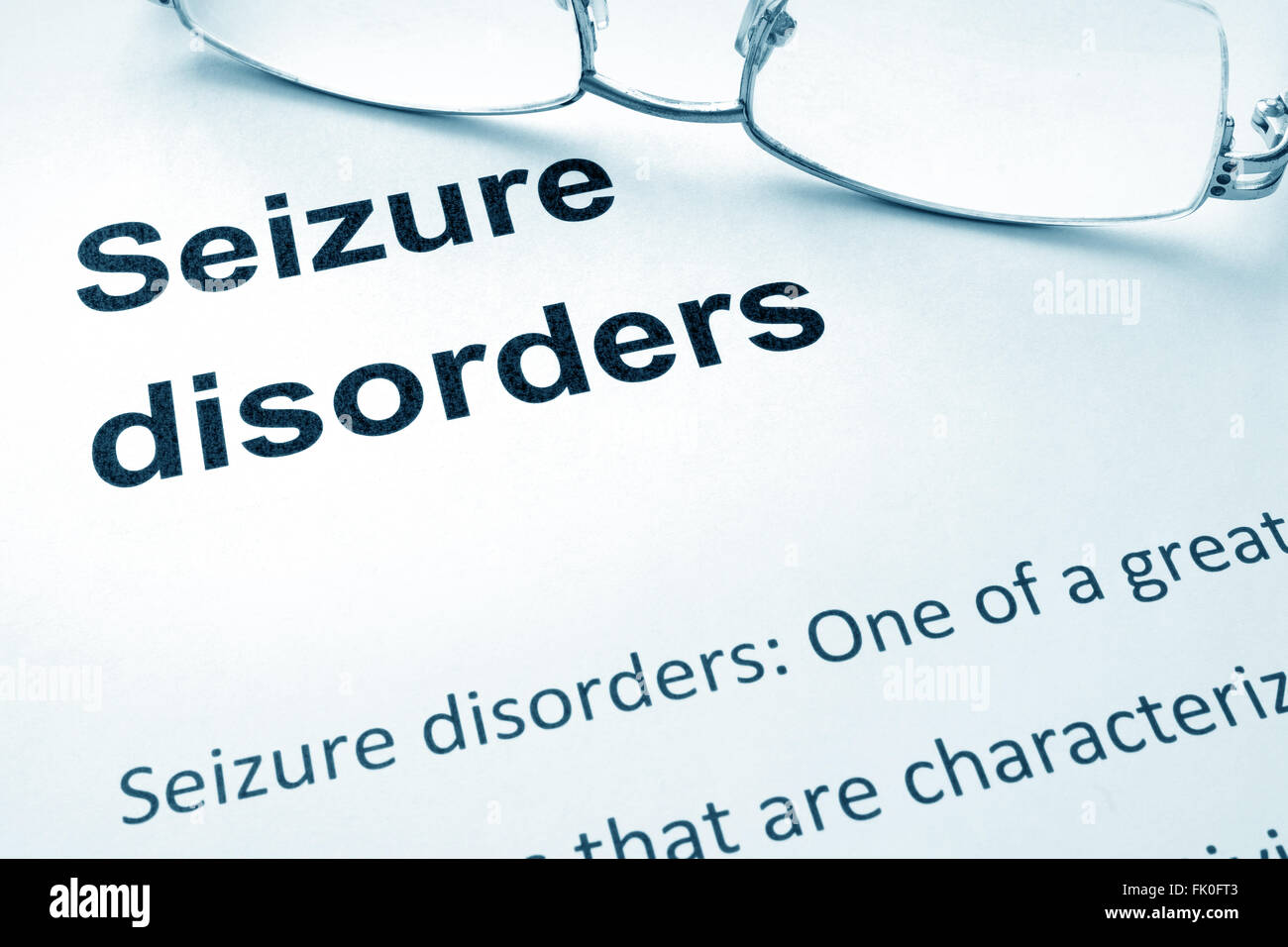 Paper with words  Seizure Disorder and glasses. Stock Photo