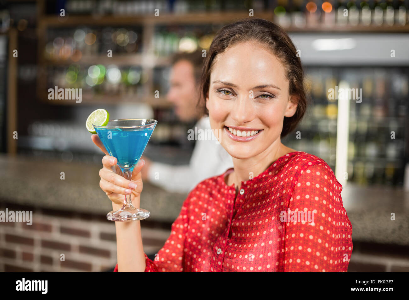 Brunette woman laughing holding hi-res stock photography and images - Alamy