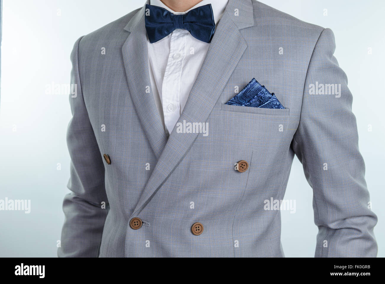 Man In Grey Suit Plaid Texture Blue Bowtie And Pocket Square Close Stock Photo Alamy