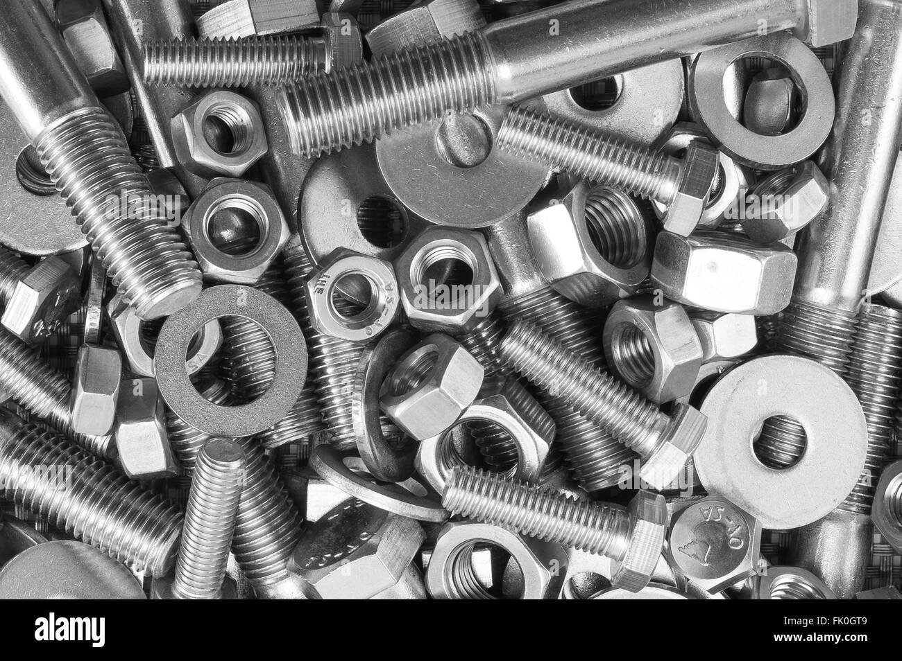 A mixture of stainless steel nuts bolts and washers Stock Photo