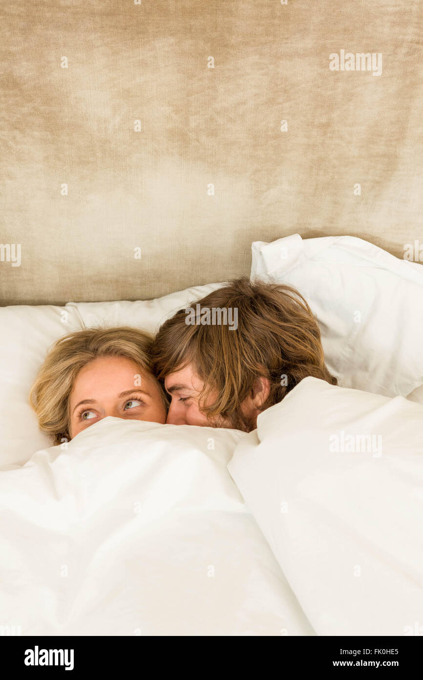 Cute couple cuddling Stock Photo