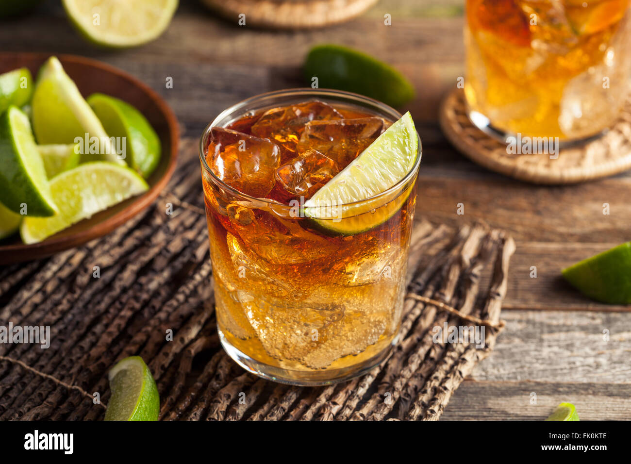 Dark and Stormy Rum Cocktail with Lime and Ginger Beer Stock Photo